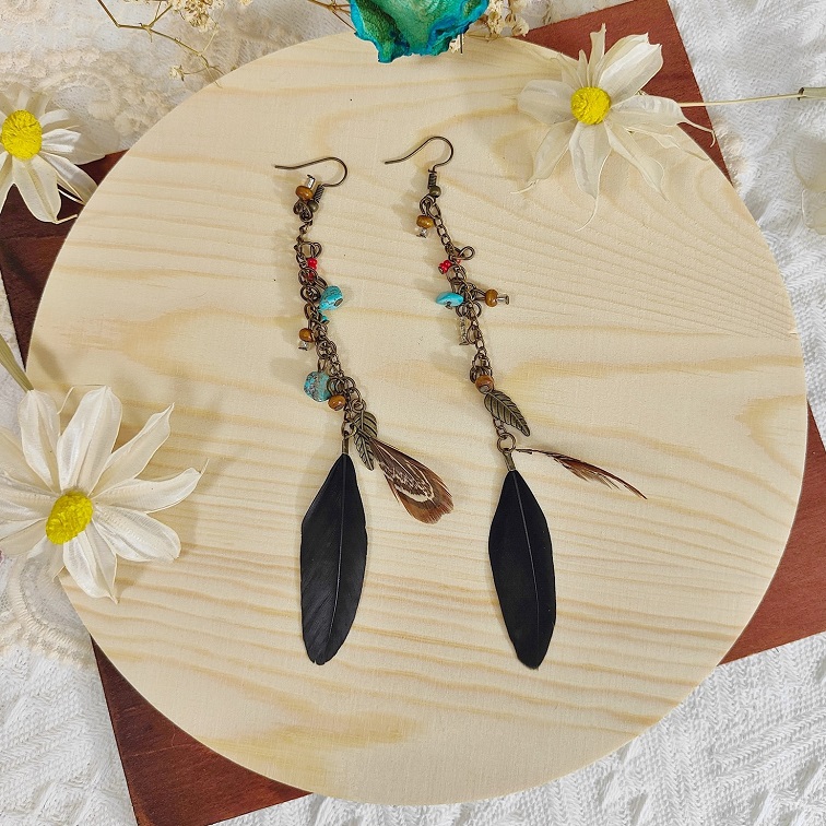 lush elemental black feather earrings