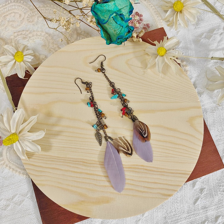 lush elemental lavender feather earrings