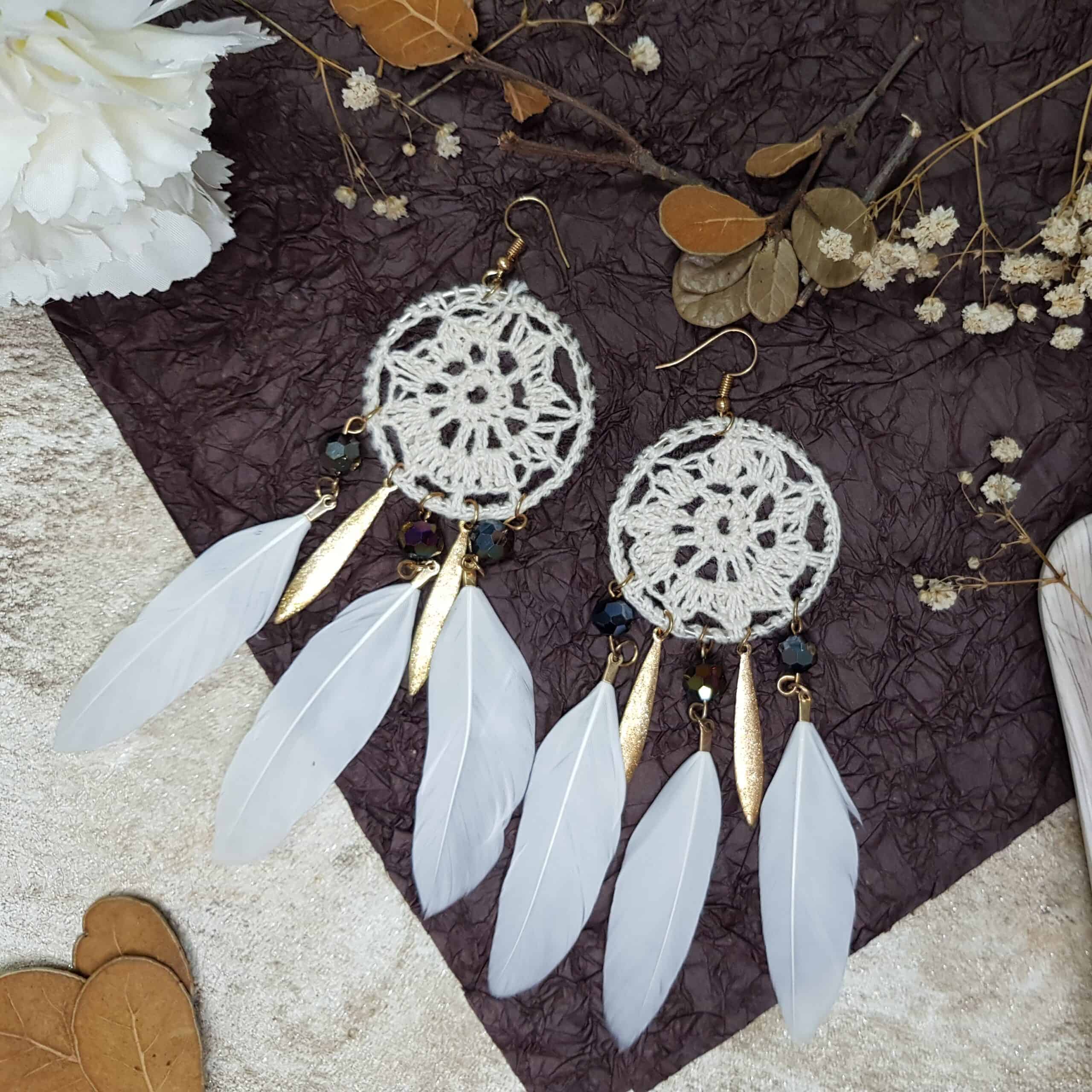 Woven iridescent off-white dreamcatcher feather statement earrings