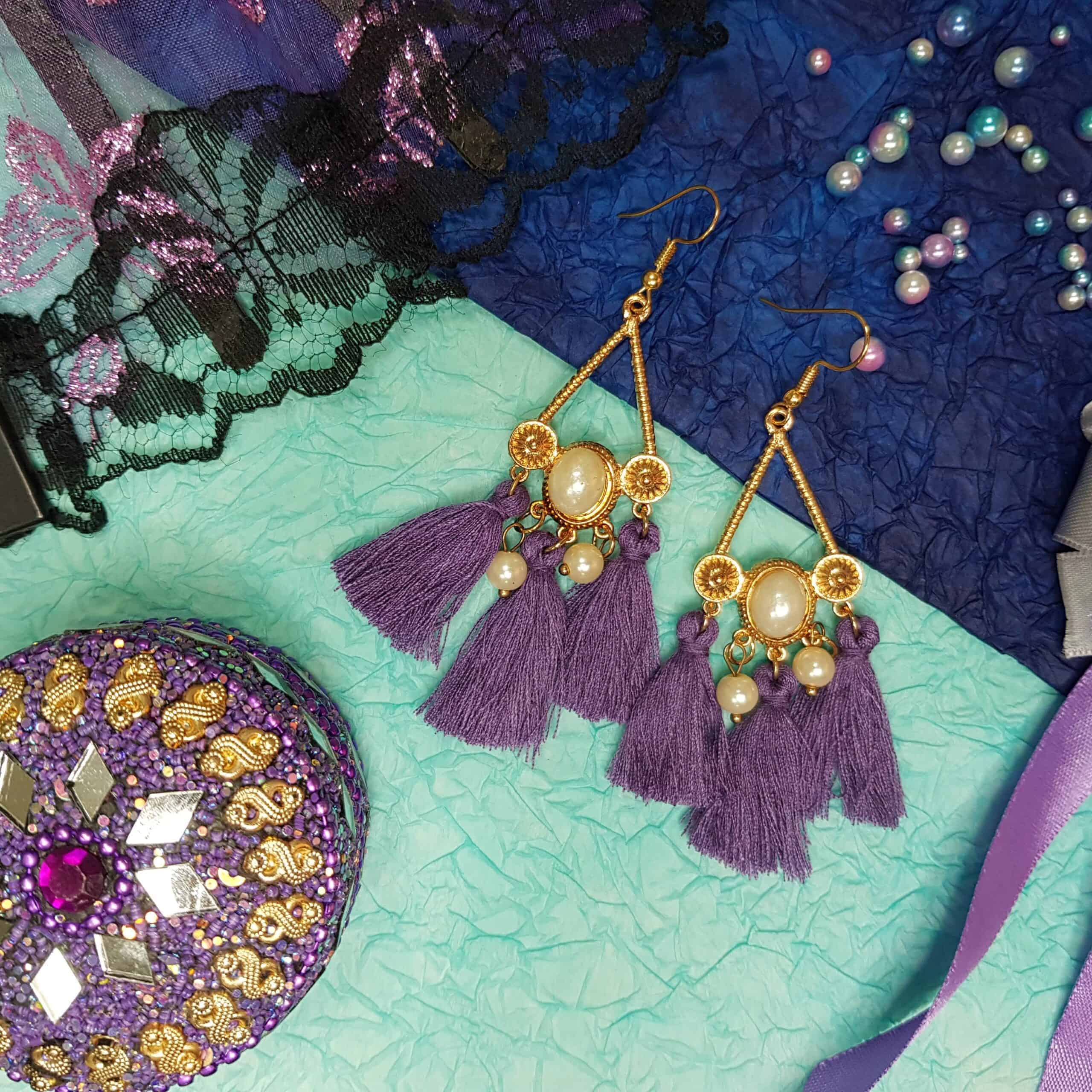 Purple Aries tassel statement earrings
