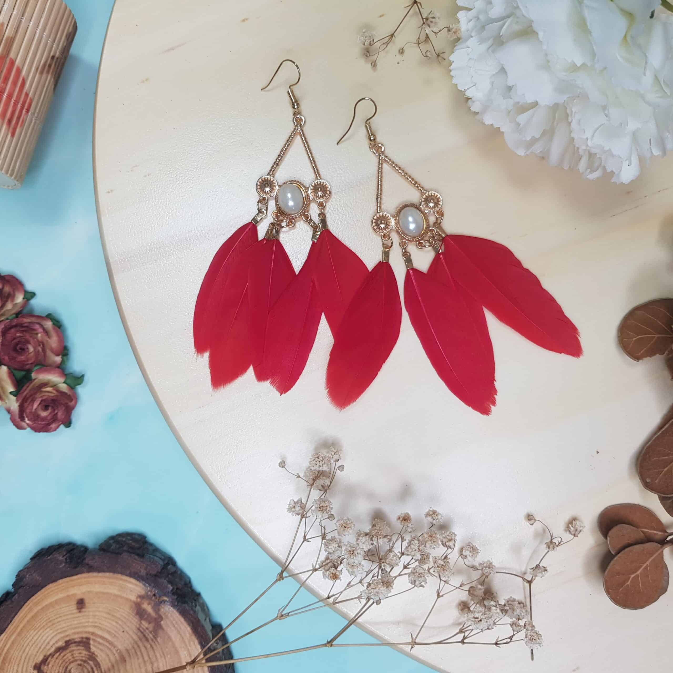 Red Aries tassel statement earrings
