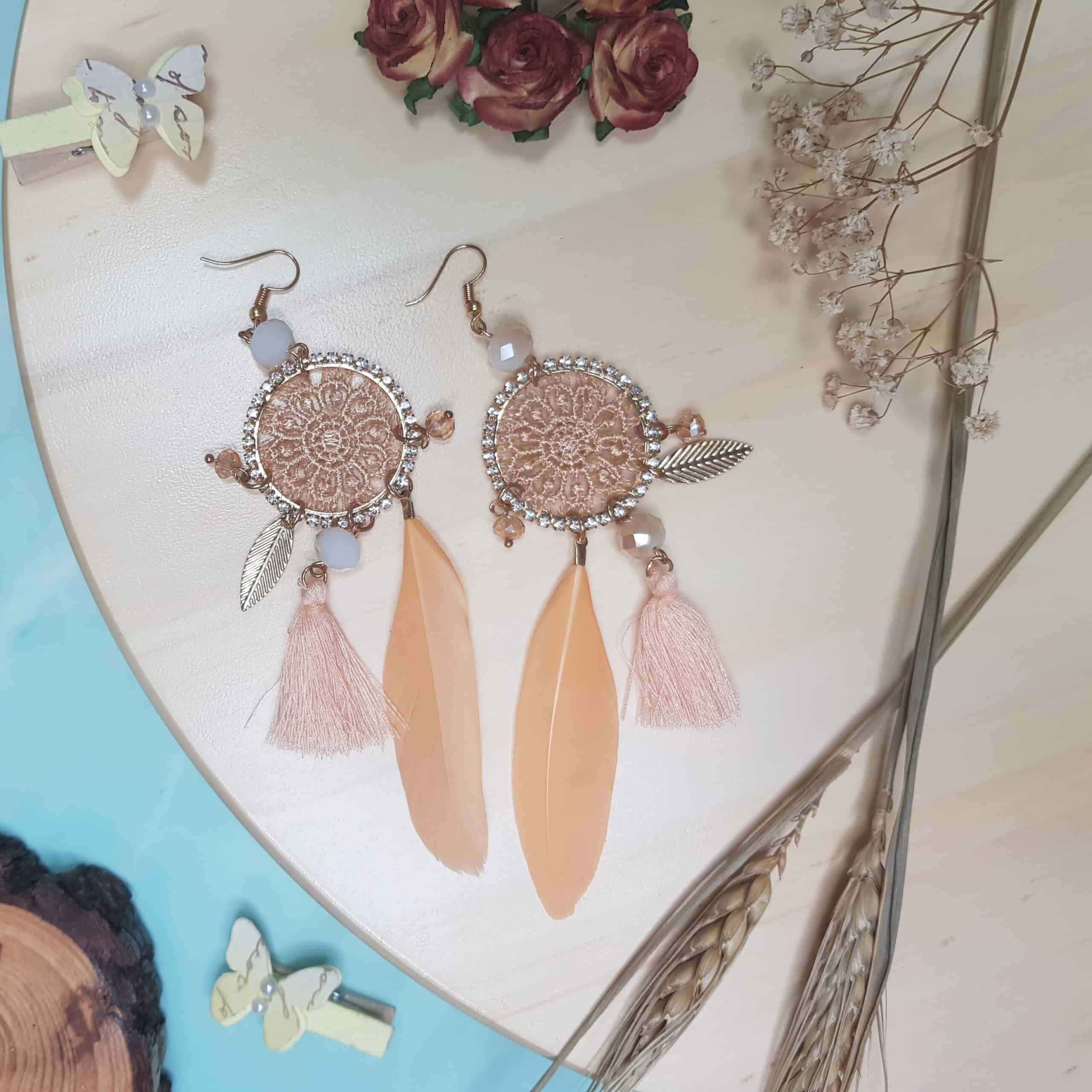 Siria peach woven dreamcatcher feather statement earrings