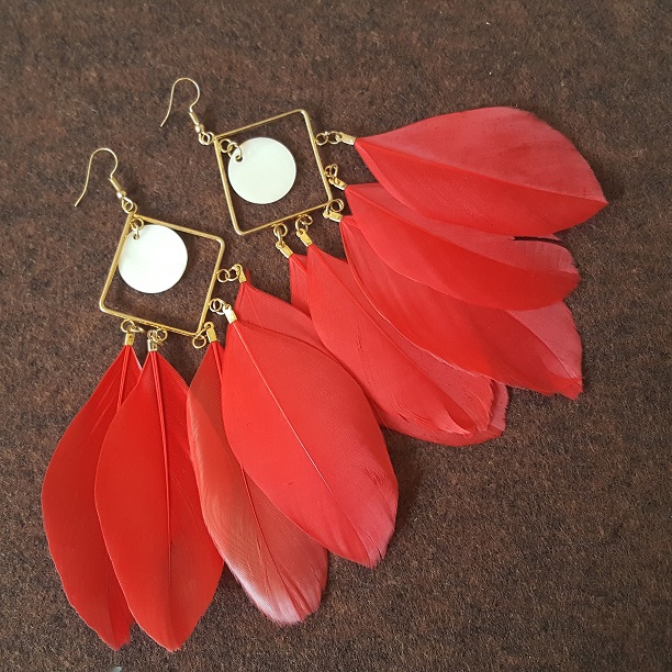 muse ruby feather earrings