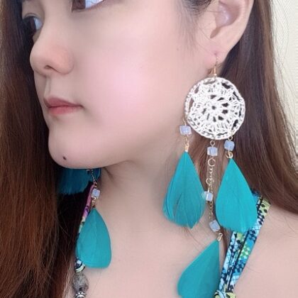 side view aqua feather dreamcatcher earrings