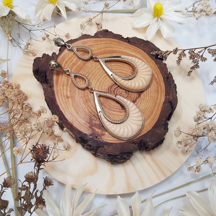 gold and nude statement earrings