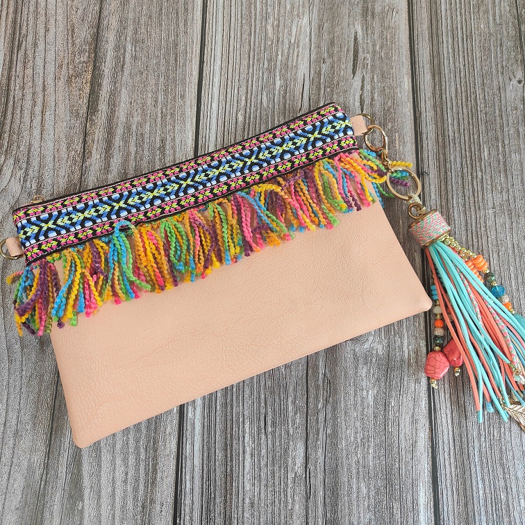 pink tribal boho tassel fringed clutch
