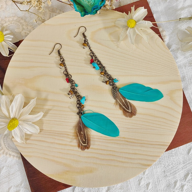 lush elemental turquoise feather earrings