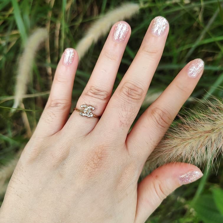 channel-fine-cursive-ring