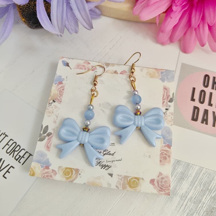 blue ribbon dangle earrings