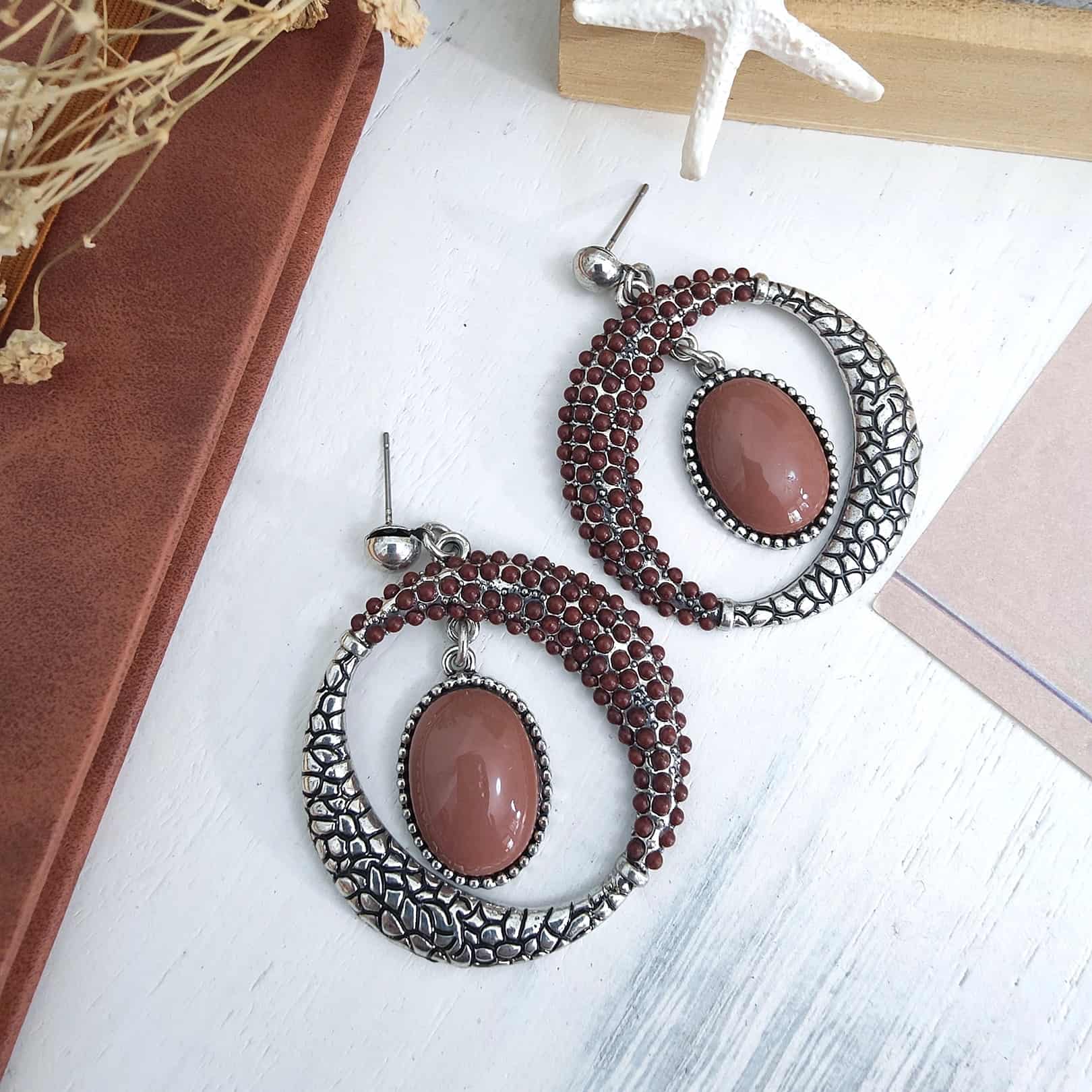 mahogany oxidised snake print statement earrings