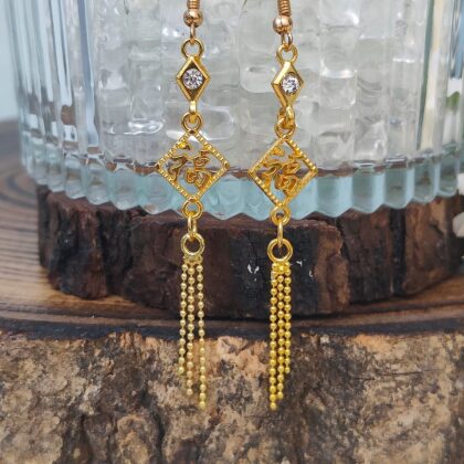 double-prosperity-gold-tassel-earrings